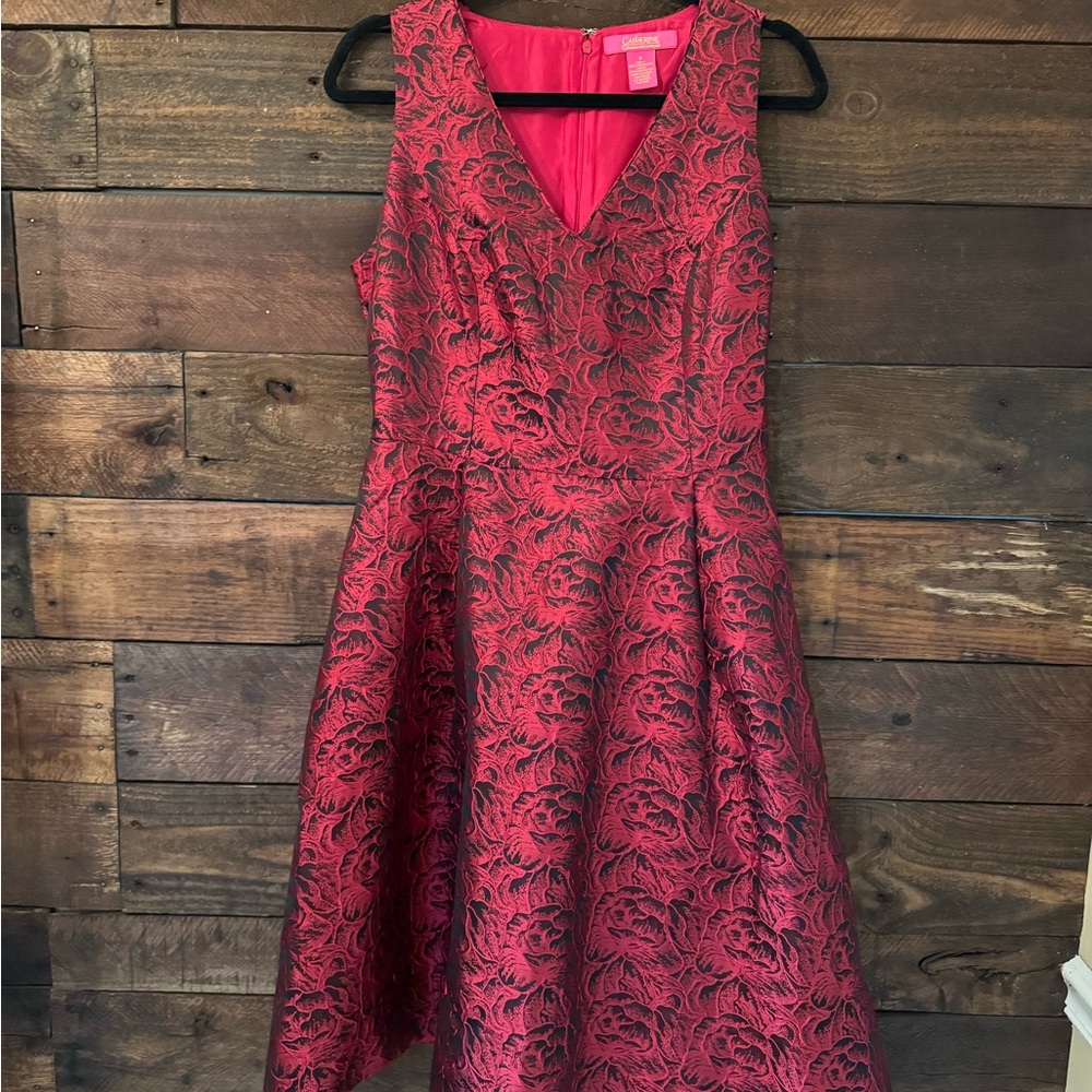Red roses and black evening gown
